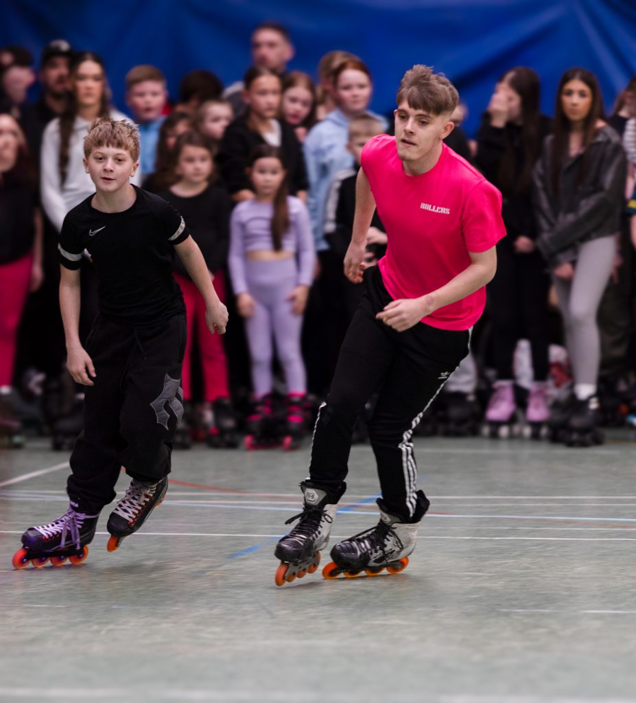 Please use the top and bottom walls to sit or stand when spectating.  You can walk your child around the walls in an anti-clockwise direction when they are learning to skate, if games are not being played.